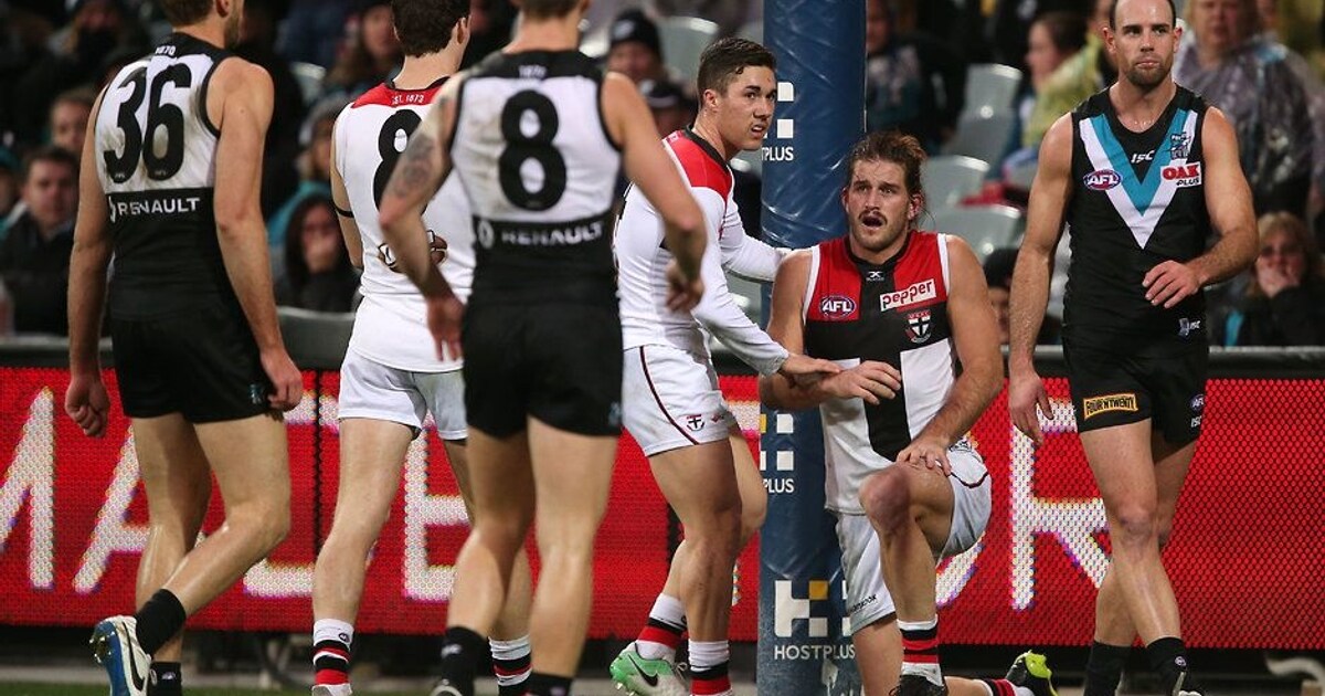Tall duo shine in wet at opposite ends